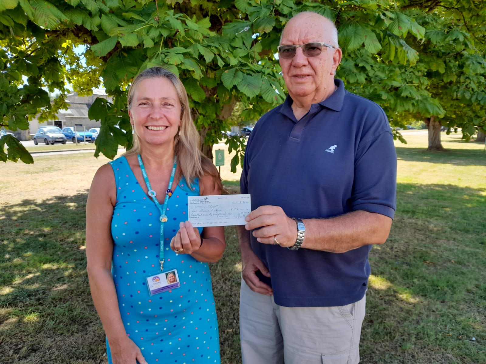 Luton Rotary Club present a cheque