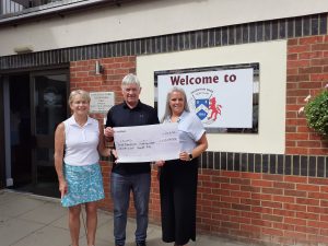 Pavenham Park Golf Club present a cheque