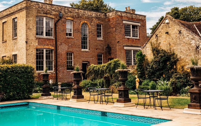Shortmead House in the background, with the heated pool in the foreground